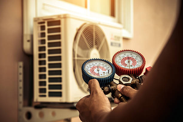 Professional Air Conditioning Service technician working in Winters, TX